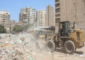 محافظة الجيزة ترفع 272 طن مخلفات من شارع فيصل وأطفيح