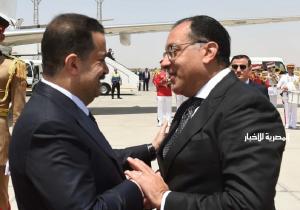 رئيس الوزراء يستقبل نظيره العراقي والوفد المرافق له بمطار القاهرة| صور