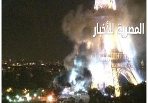 دخان كثيف يغطي برج "إيفل" فى فرنسا