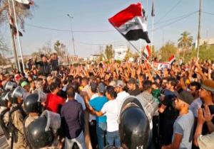 محتجون فى العراق يطالبون بغداد بالنأى بنفسها عن المواجهة بين أمريكا وإيران