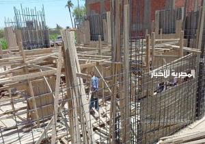 التصدي لبناء مخالف في شارع طوسون بحي روض الفرج