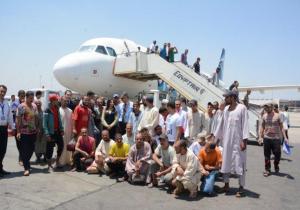مطار القاهرة : عودة 101 صياد مصري كانوا محتجزين في السودان 