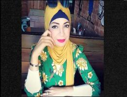 نشوي شطا تكتب التعذيب باللون الأبيض