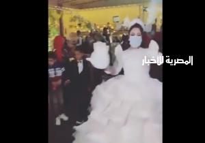 الاستهتار يؤدي إلى الكوارث.. حفل زفاف يتحدى كورونا بالكمامات | فيديو