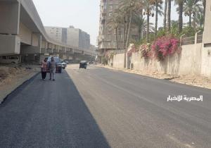 استمرار أعمال رصف شارعي ترعة الزمر والثلاثيني بالعمرانية / صور