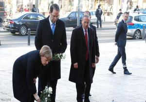 ميركل ورئيس وزراء تونس يستعيدان ليلة برلين الدامية